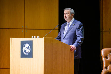 Rabbi Dr. Ari Berman, President of Yeshiva University, welcomes event attendees.